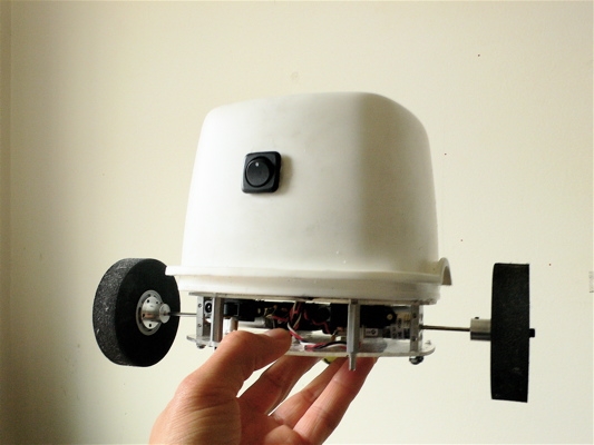 BARB from another angle, showing the rear-mounted brush trailing low to the ground.